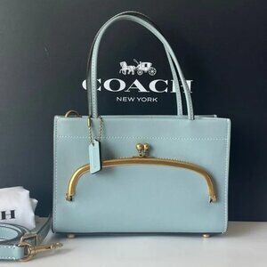 Coach Sky Blue Crossbody Bag with Gold Details